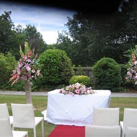 fwthumbOutdoor ceremony. Long & low on registrar's table.jpg